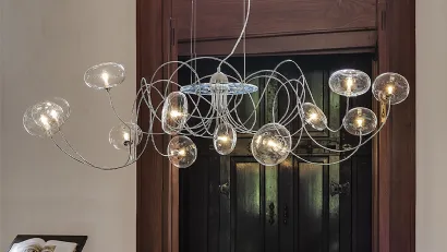 Lampada a sospensione con bracci in cromo e paralumi in cristallo Oktopus di Cattelan Italia