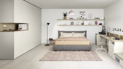 Cameretta componibile con letto matrimoniale in tessuto imbottito, scrivania e mensole Next space 08 di Nidi