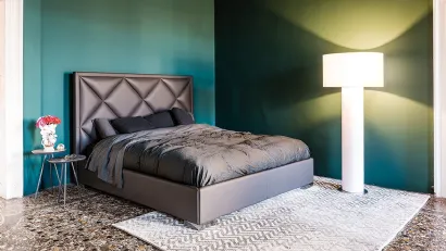 Letto contenitore in ecopelle con testiera lavorata a rombi Patrick di Cattelan Italia