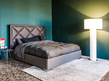 Letto contenitore in ecopelle con testiera lavorata a rombi Patrick di Cattelan Italia