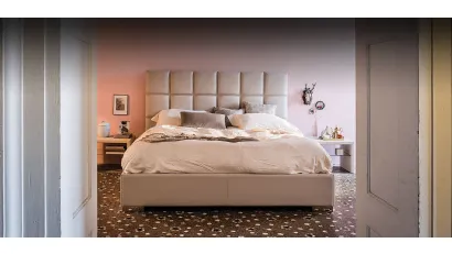 Letto contenitore con testiera in ecopelle trapuntata William di Cattelan Italia