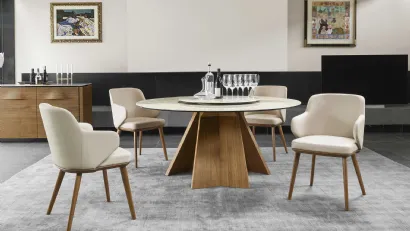 Tavolo rotondo con piano in ceramica e basamento in legno Icaro di Calligaris