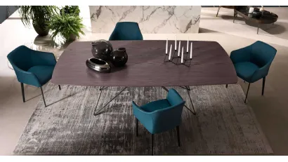 Tavolo Pegaso con top in Legno e base in tondino metallico di Riflessi