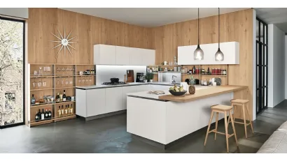 Cucina Moderna Oyster con penisola in finitura Silk Bianco Neve e Rovere nodoso chiaro di Veneta Cucine